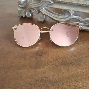 Rose gold reflective sunglasses